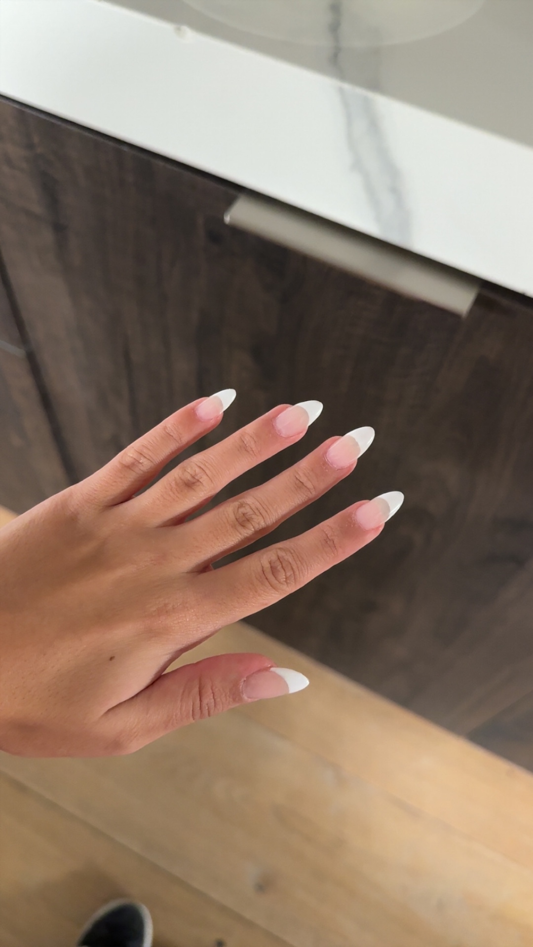 Classic white French almond nails